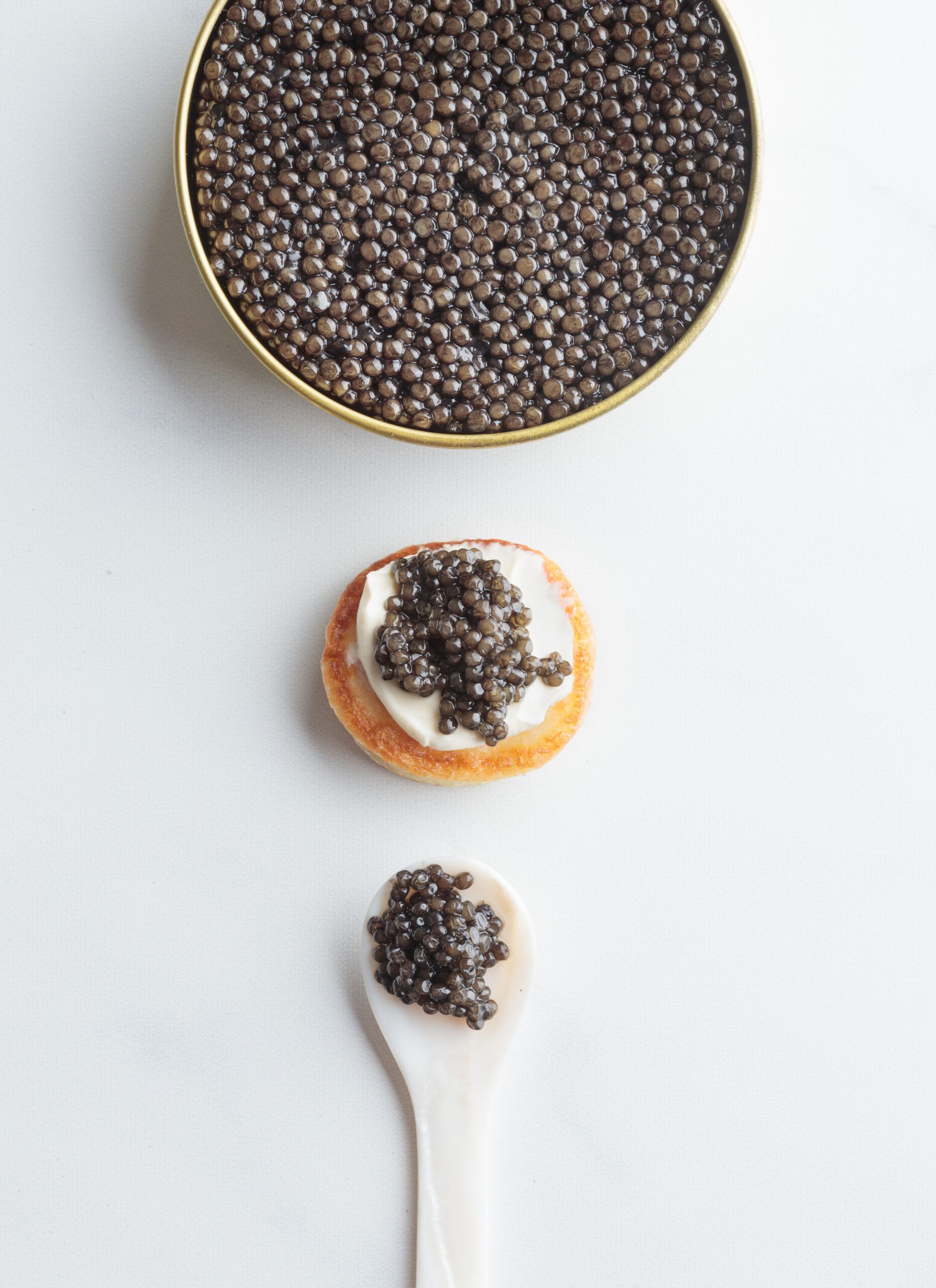 Osetra caviar service with traditional accompaniments presented for New Year’s Eve at The Tasting Room in Traverse City.