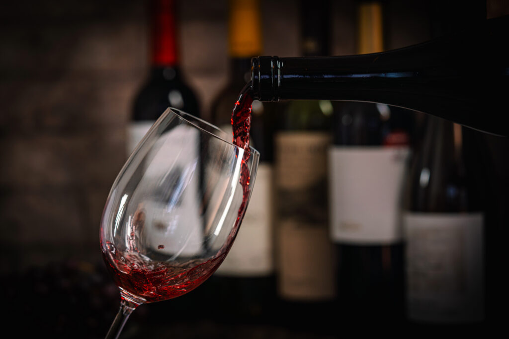 Wine being poured at The Tasting Room in Traverse City